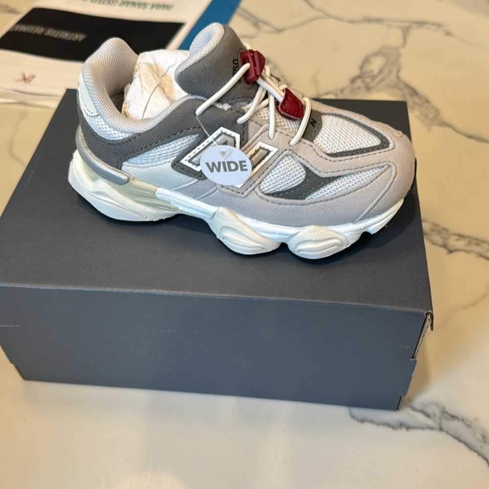 New Balance Little Kid Sneakers NWT in original packaging, never used. WIDE